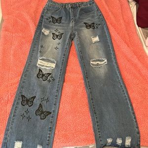 Bleach Wash Ripped Detail Butterfly Jeans.